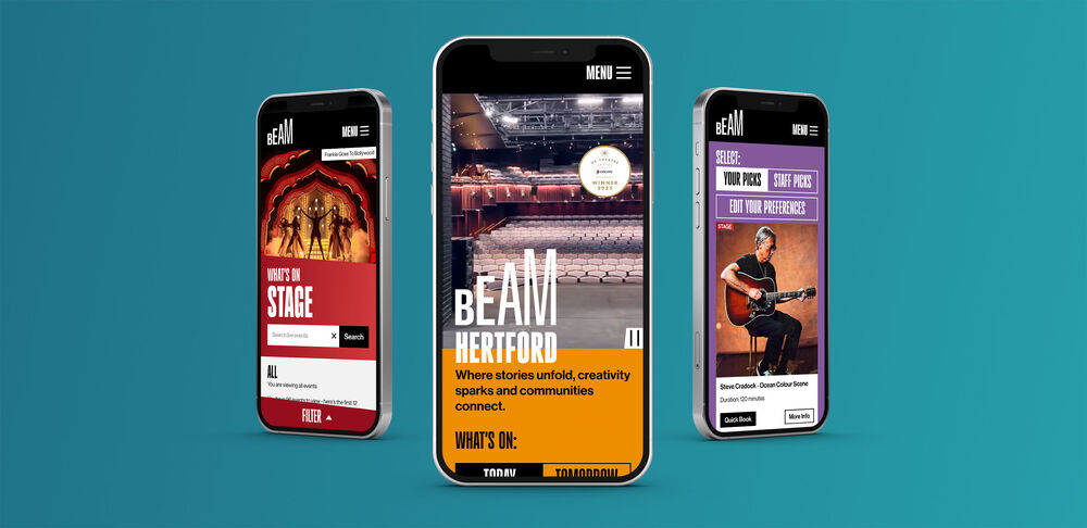 Three phones show the website on a blue background