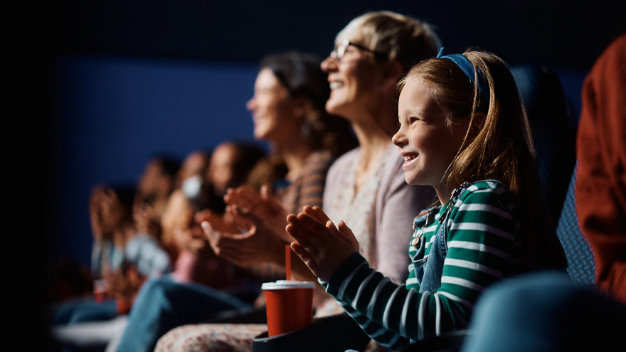 Families enjoying a show