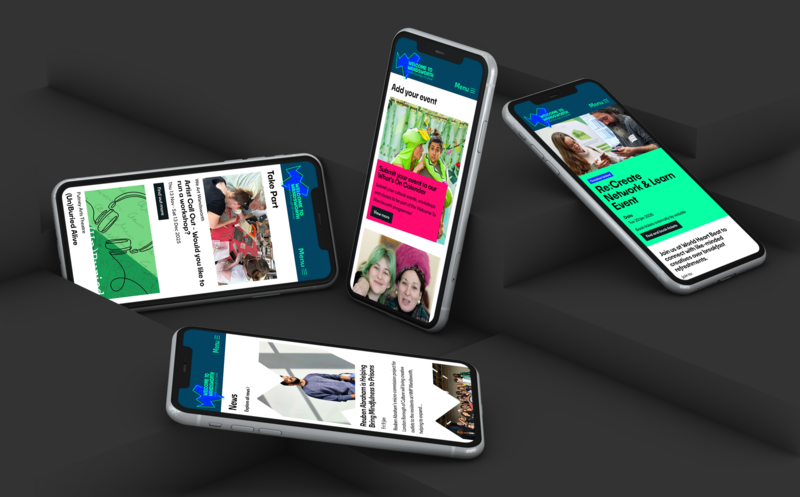 Four phones in different positions show the website
